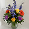 This arrangement is perfect to make someone&#039;s day! Created with bright gerbera