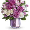 PURPLE, PINK AND WHITE FLOWERS MIXED WITH LEATHER LEAFF AND LEMON LEAF