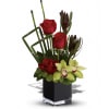 This gloriously modern bouquet of roses and orchids against a backdrop of