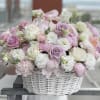 Blush Basket Garden &mdash; a dreamy floral arrangement featuring soft pastel roses