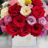 Our exclusive designs of fresh flowers in the beautiful queen box are