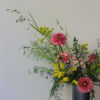 Using texture, shape and color, this small wild flower bouquet is perfect