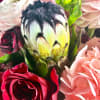 So lush! This luxe box features pink and red stems with green