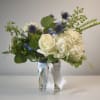 Each arrangement is custom designed, using seasonal, best-of-day blooms. The image shown