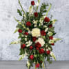 Large Sympathy spray with red and white mixed flowers.