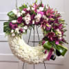 Honor them with soft pink accents. Spray stand included. 