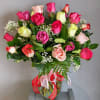 An impressive arrangement of 2 dozen mixed color 40-50 centimeter roses in