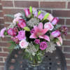 Designed by one of our local gals, this softly sweet arrangement makes