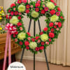 Send a heartfelt message with this beautiful standing spray, created with cheery