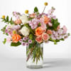 Serene and fragrant, this arrangement blends soft pastels to create a gift