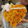 Roses, worded ribbon, and gold butterflies all in a heart shaped container
*Please
