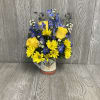 Beautiful arrangement of fresh cut flowers in a keepsake ceramic mug. Flowers