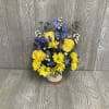Beautiful arrangement of fresh cut flowers in a keepsake ceramic mug. Flowers