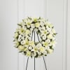  The Treasured Tribute Wreath offers peaceful wishes of heartfelt sympathy with