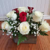 Standard: 9 White and 3 Red Rose&#039;s
Deluxe:12 White roses and 6 red