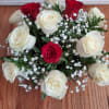 Standard: 9 White and 3 Red Rose&#039;s
Deluxe:12 White roses and 6 red