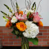 Very happy  colors, orange,light pink, white flowers.