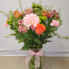 This bouquet is festive and perfect for any celebratory occasion. The arrangement