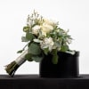 Celebrate your special day with our beautiful bridal bouquet featuring classic white