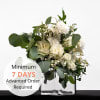 Celebrate your special day with our beautiful bridal bouquet featuring classic white
