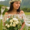 Celebrate your special day with our beautiful bridal bouquet featuring classic white