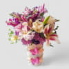 Send this beautiful bouquet today to make them smile with lilies and