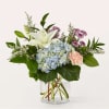 Unwind with the gentle and healing colors of this arrangement featuring dreamy