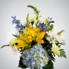 Brighten any space with our Sunlit Serenity arrangement&ndash; a radiant mix of