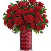 Absolutely stunning! This striking all-red bouquet is beautifully arranged in a glass