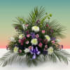 Assorted purple, pink, and white alstroemeria, carnations, and delphiniums. 
