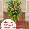 This bright and cheery standing spray is perfect for the service and