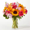 A playful combination of hues and texture, this bouquet will fill their