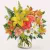 Give the gift of sunshine with these lush orange and yellow blooms