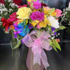 fresh Colorfull  flowers in soft pink vase 