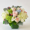 This beautiful collection of soft peach, cream and green tones; includes hydrangea