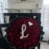 A touch of love in a 50 Red Rose Bouquet. Add your