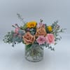 Mila is an adorable mix of Toffee Roses, Mini Sunflowers, Pink Roses
