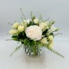 Beignet features White Peonies, Cream colored Vendela Roses, White Spray Roses and