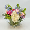 Summer Bliss features White Hydrangea, Mini Green Hydrangea, Pink Peonies, Peach Roses