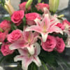 Simple and Tall design arranged with Pink Lilies, one dozen Pink Roseswith