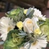A unique take on the typical fall pumpkin arrangement! This arrangement makes