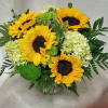 Introducing the Radiant Sunshine flower arrangement, a stunning display of vibrant beauty
