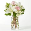 The Kindhearted Bouquet is a gentle swirl of pale pink and ivory
