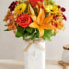 Get them buzzing for fall! Our unique, stylized bouquet is gathered with