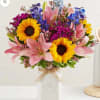 Get them buzzing with our charming bouquet! A garden-fresh gathering of blooms