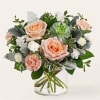 With enticing pops of peach, the Sweet Tea Bouquet is the perfect