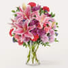 Pink lilies, carnations and spray roses will effortlessly relay your heartfelt message.

Details
Designed