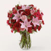 As captivating as the fluttering wings of a butterfly, this arrangemennt of