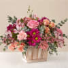Designed with lavish flowers in an array of pink and coral shades