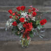 A timeless classic. Traditionally designed premium AAA grade extra long stem red